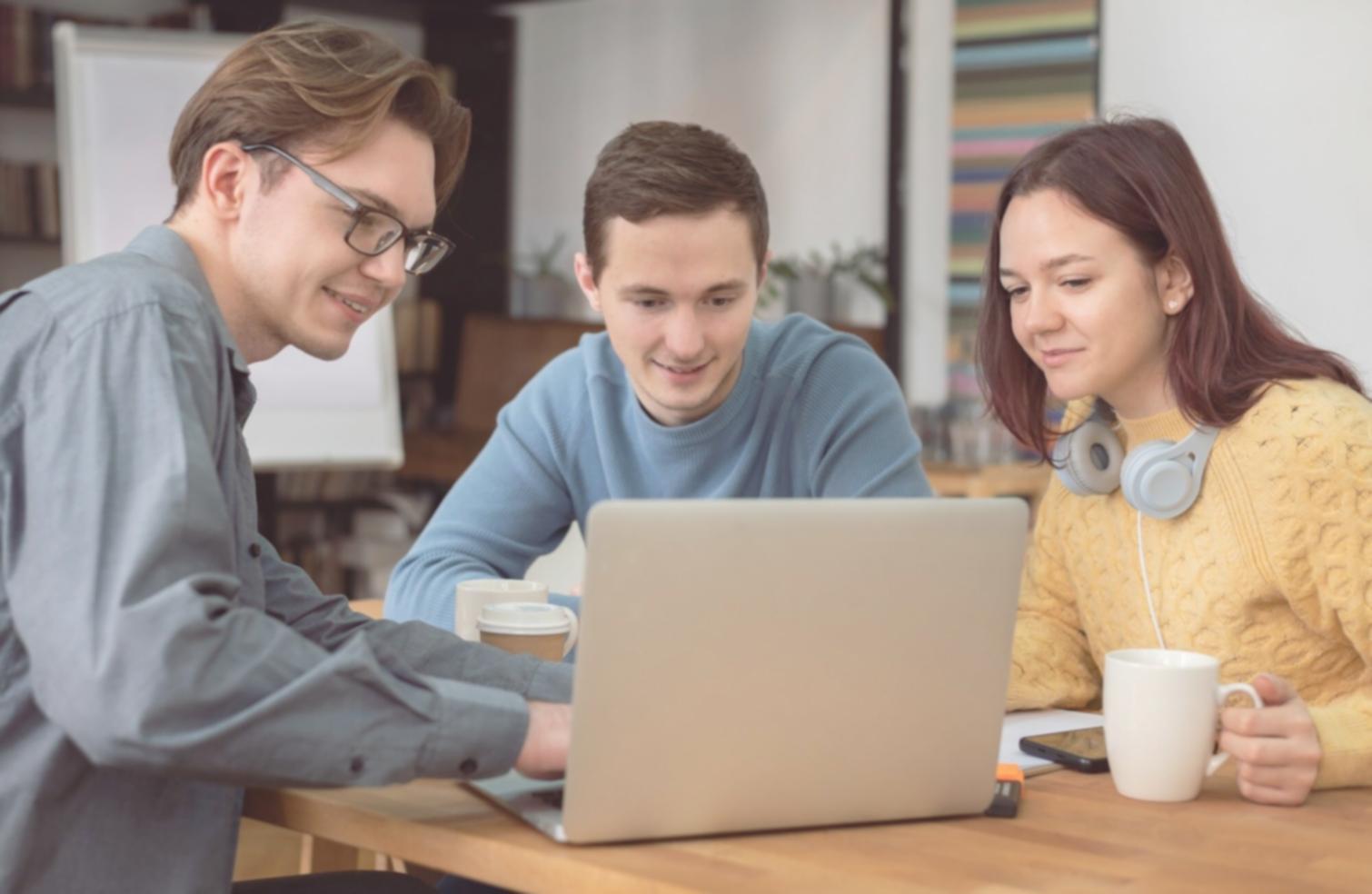 Business taxation consulting team reviewing client documents